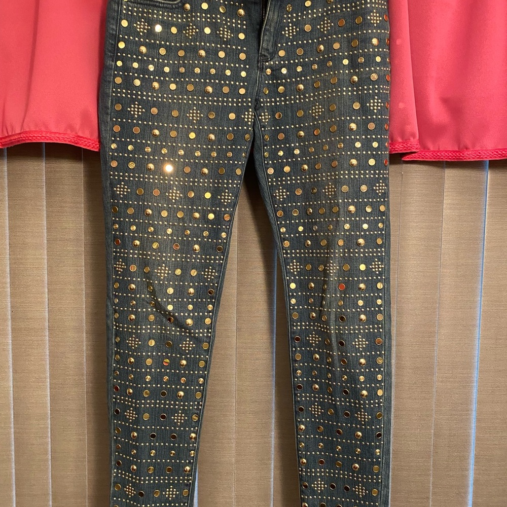 Michael Kors gold studded blue jeans